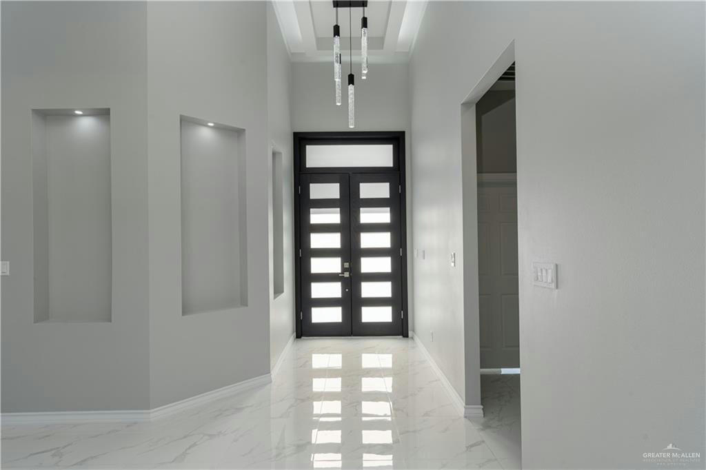 Adepec Homes — Modern Retreat Grand Entryway